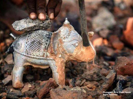 The art forms of Odisha: yet another place of art work, in my home district, I didn't know there are so many. Just out of furnace Dhokra metal casting craft at Nabajaubanpur, Dhenkanal. Photo credits: Ar Shakti Nanda